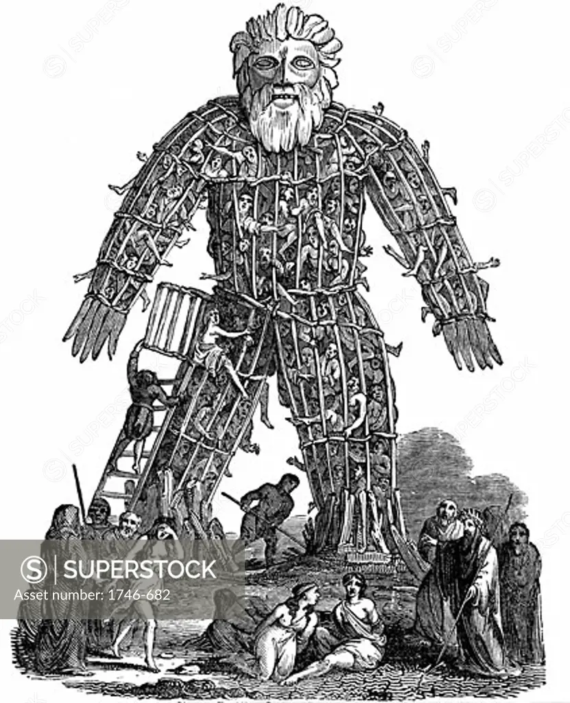 Druids making human sacrifice to their gods, based on report by Julius Caesar. Druids, the priests, teachers and judges of Celts suppressed by Romans c50 AD. Woodcut 1832. Wicker Man