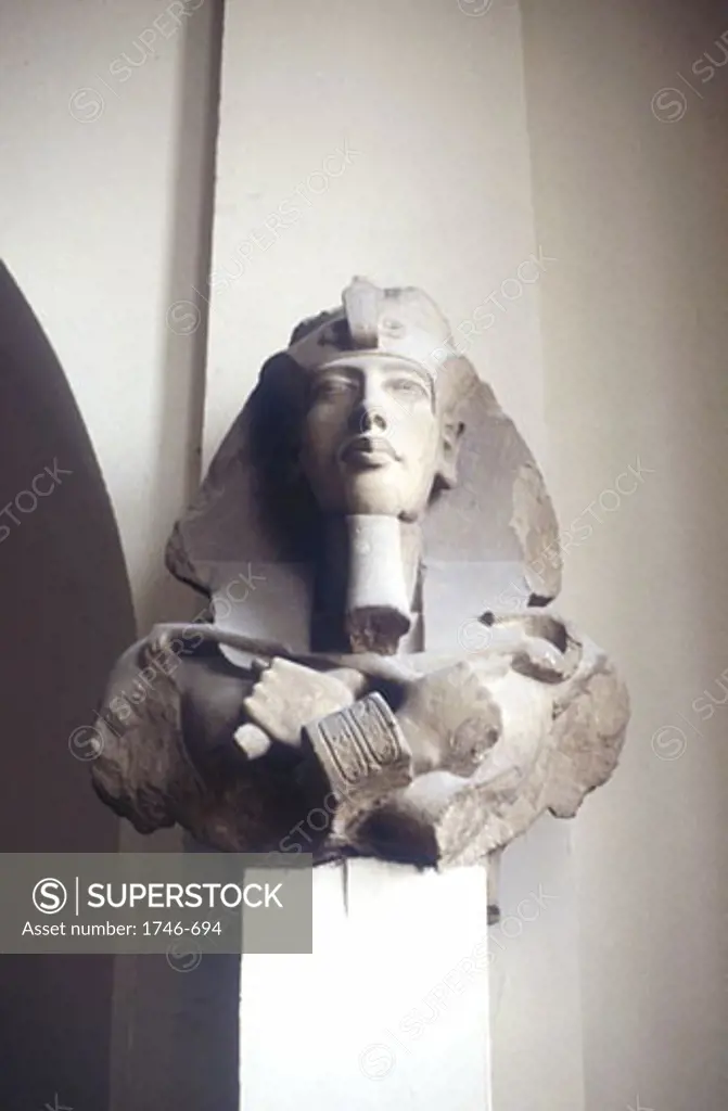 Ancient Egypt, 18th dynasty. Carved head of king Akhenaton.