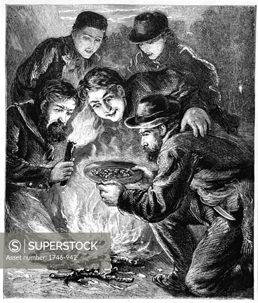 Miners in the Californian gold fields inspecting the result of their digging by the light of the camp fire.  Wood engraving London c1880