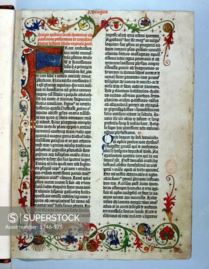 Page of Bible printed by Gutenberg, 1456. Illuminated border typical of a manuscript.