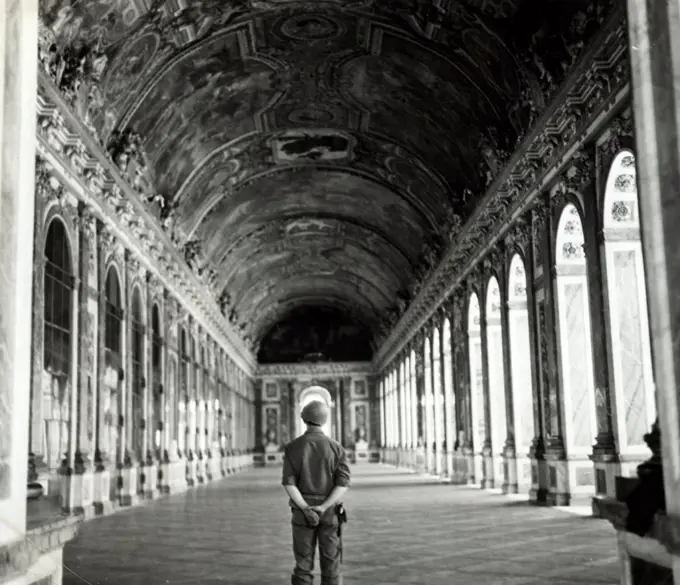 American soldier Versailles standing in the hall of mirrors 1944. World War two