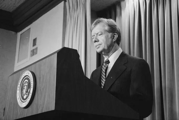 Photograph of President Jimmy Carter announcing new sanctions against Iran following the taking American hostages. Photographed by Marion S. Trikosko. Dated 1980
