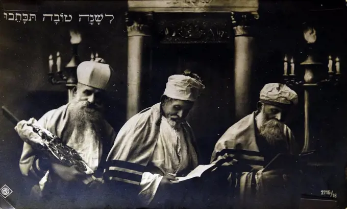 Dutch New Year Card c1910. The card shows three rabbi's in a synagogue, wearing traditional prayer shawls (tallit) c 1915.