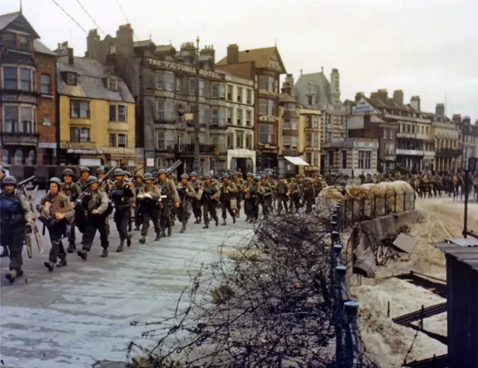 US troops ready to board landing ships at Weymouth, England for the D Day Normandy Invasion 1944