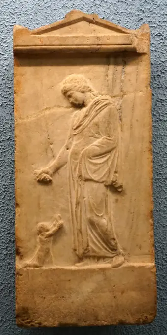Marble tombstone depicting a woman leaving her child. Dated 400 BC