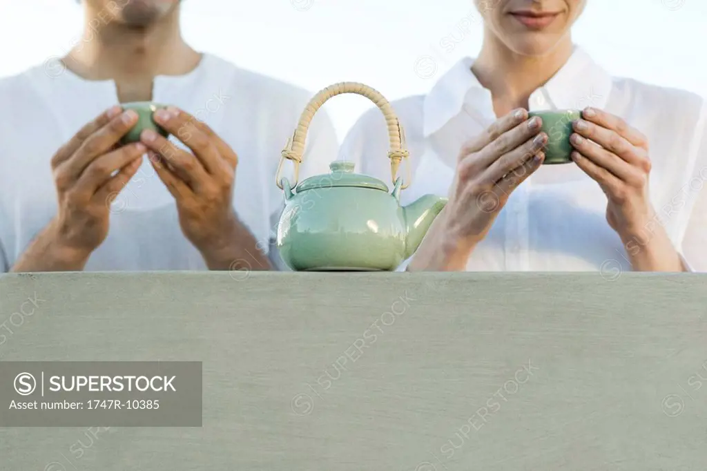 Man and woman having tea