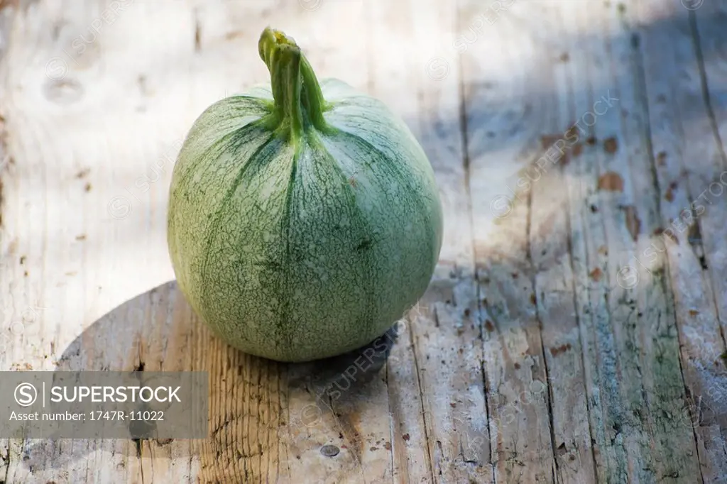 Squash on wooden background