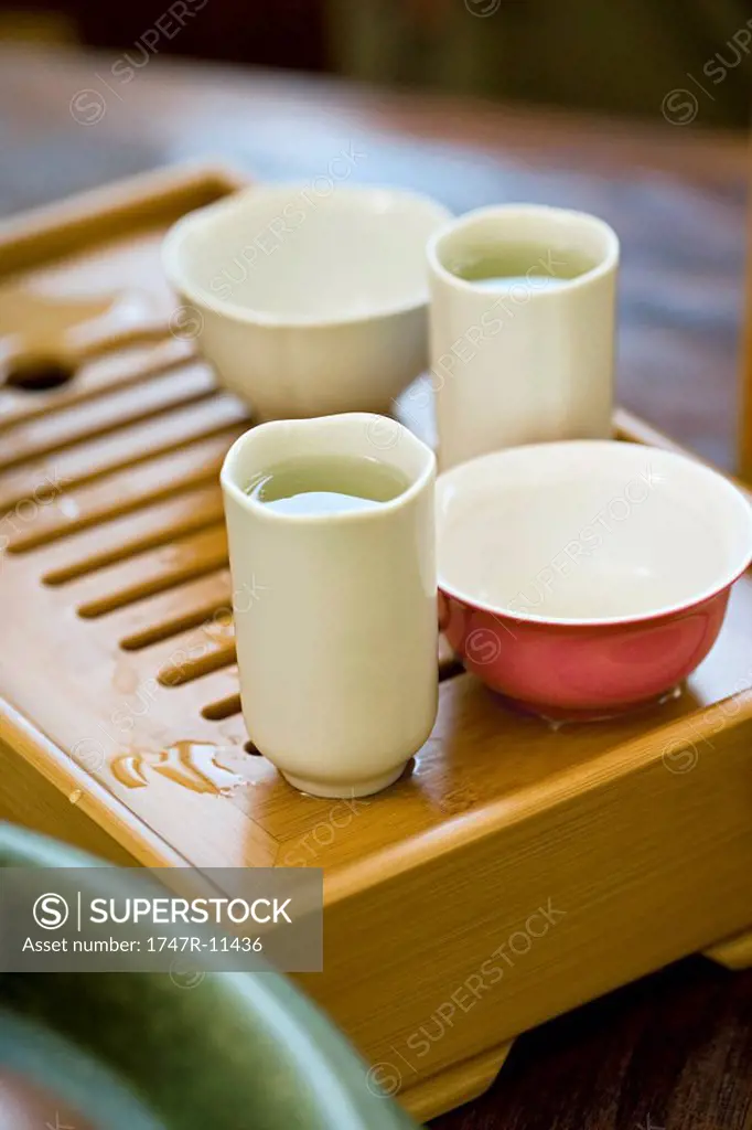 Bamboo tea tray with two aroma cups and two tasting cups