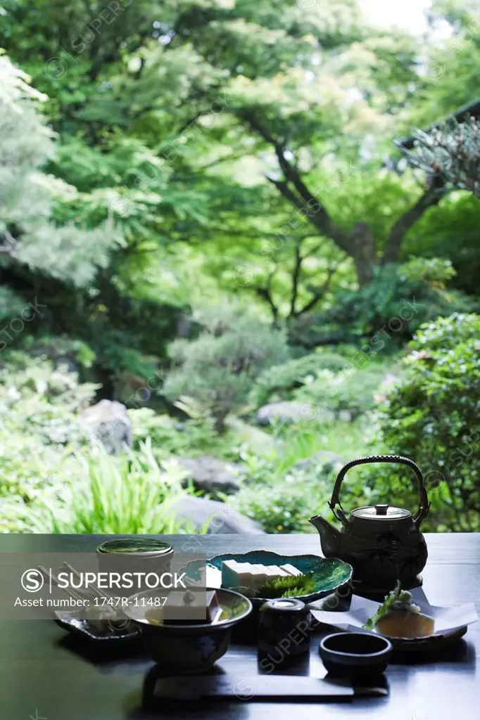 Traditional Japanese meal on table outdoors
