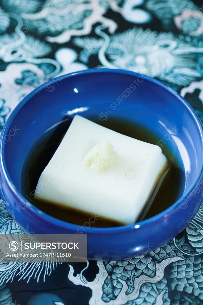 Goma dofu Japanese tofu specialty made from sesame and kudzu powder with soy sauce and horseradish
