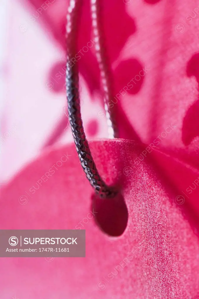 Pink gift tag, extreme close-up
