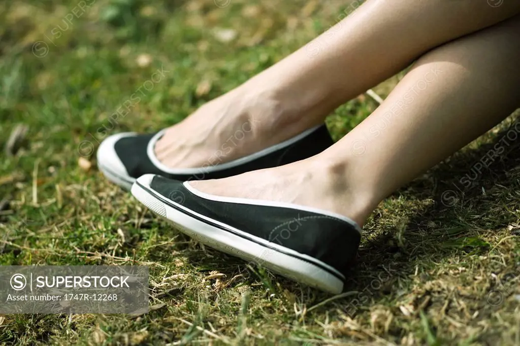 Female outdoors, close_up of shoes