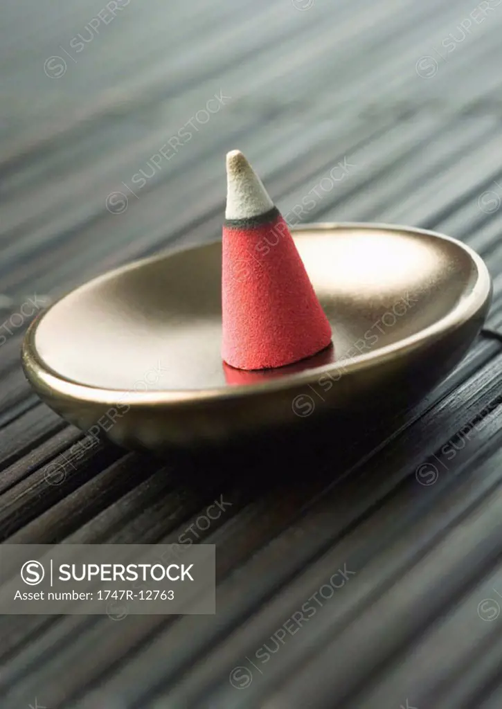 Incense cone burning