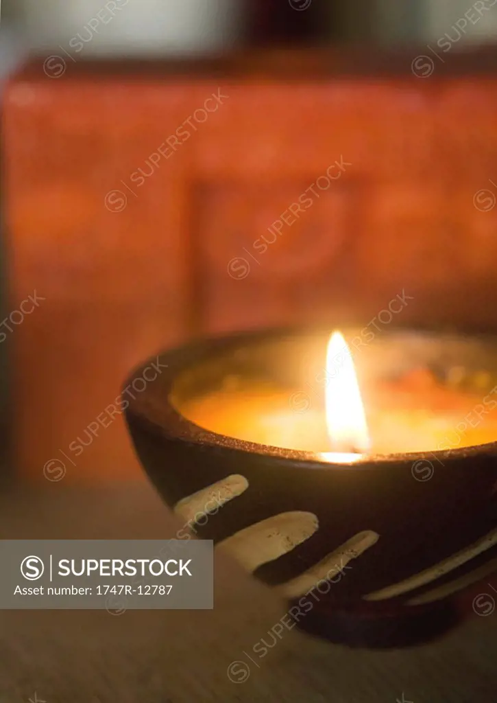 Lit candle