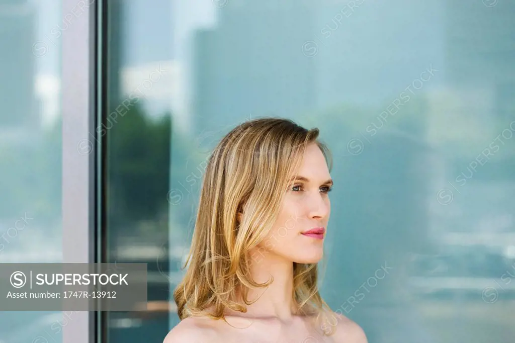 Woman looking away in thought, portrait