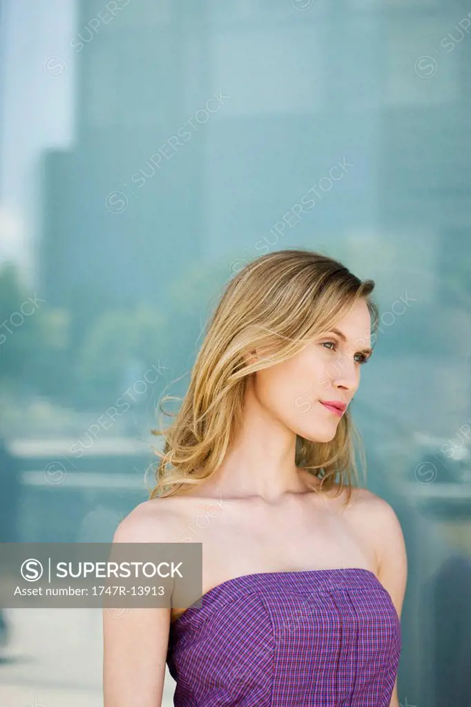 Woman looking away in thought, portrait