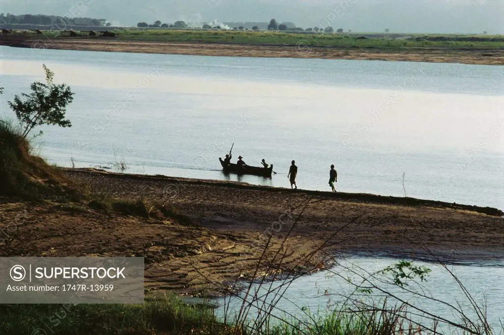 Myanmar Burma, landscape with fishermen and canoe