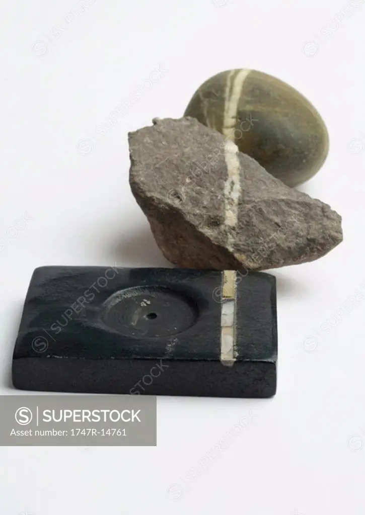 Pebble, stone, and incense holder