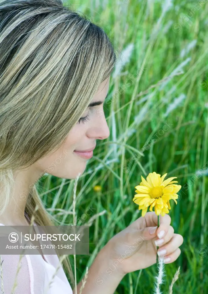 Woman holding flower