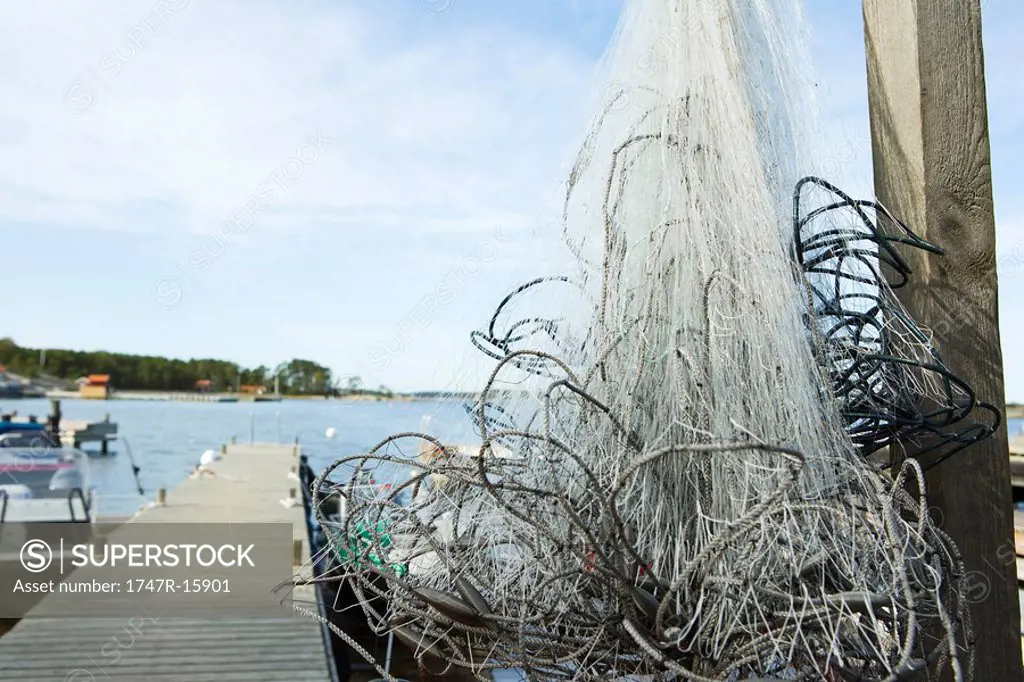 Tangled fishing nets on dock