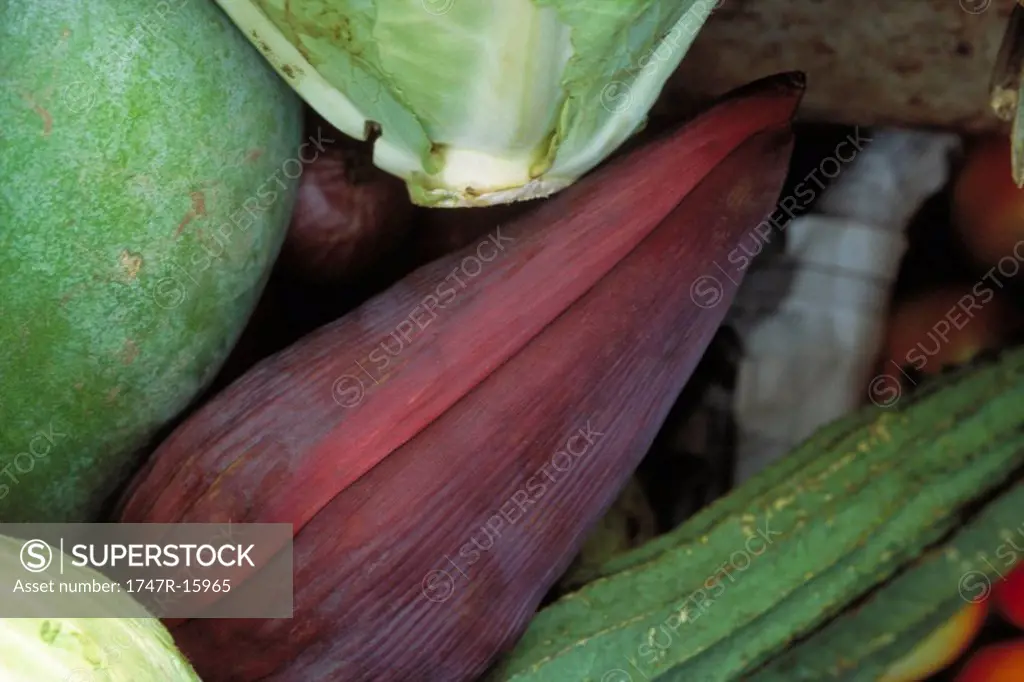 Banana flower and assorted vegetables, close-up