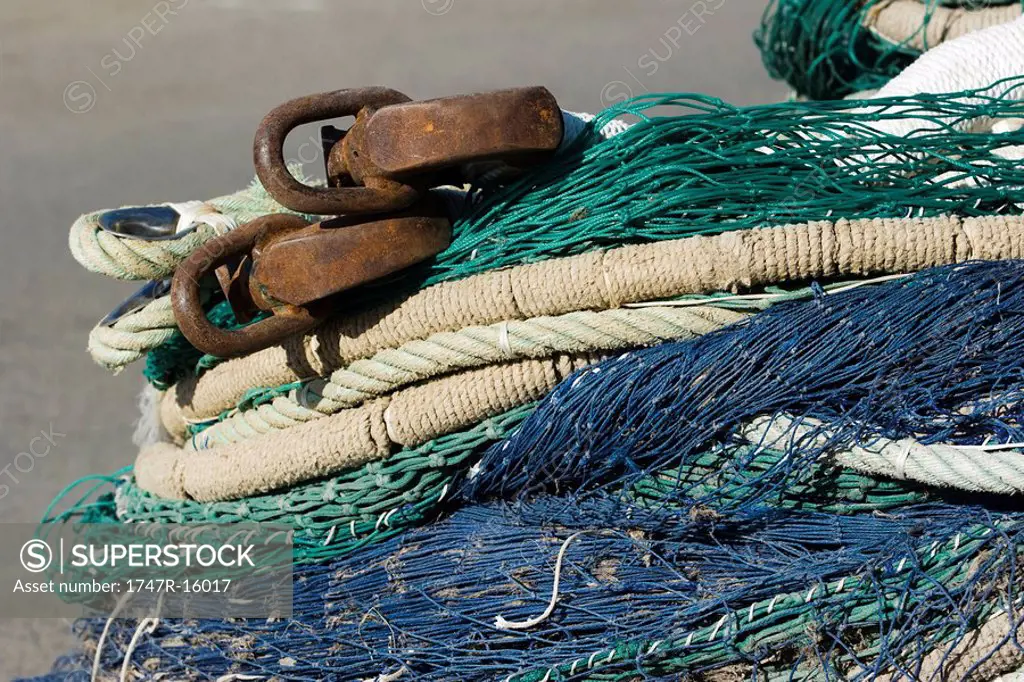 Fishing nets and ropes in a heap, extreme close-up