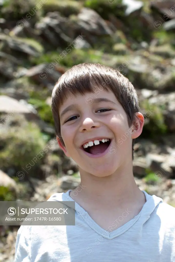 Boy laughing, portrait