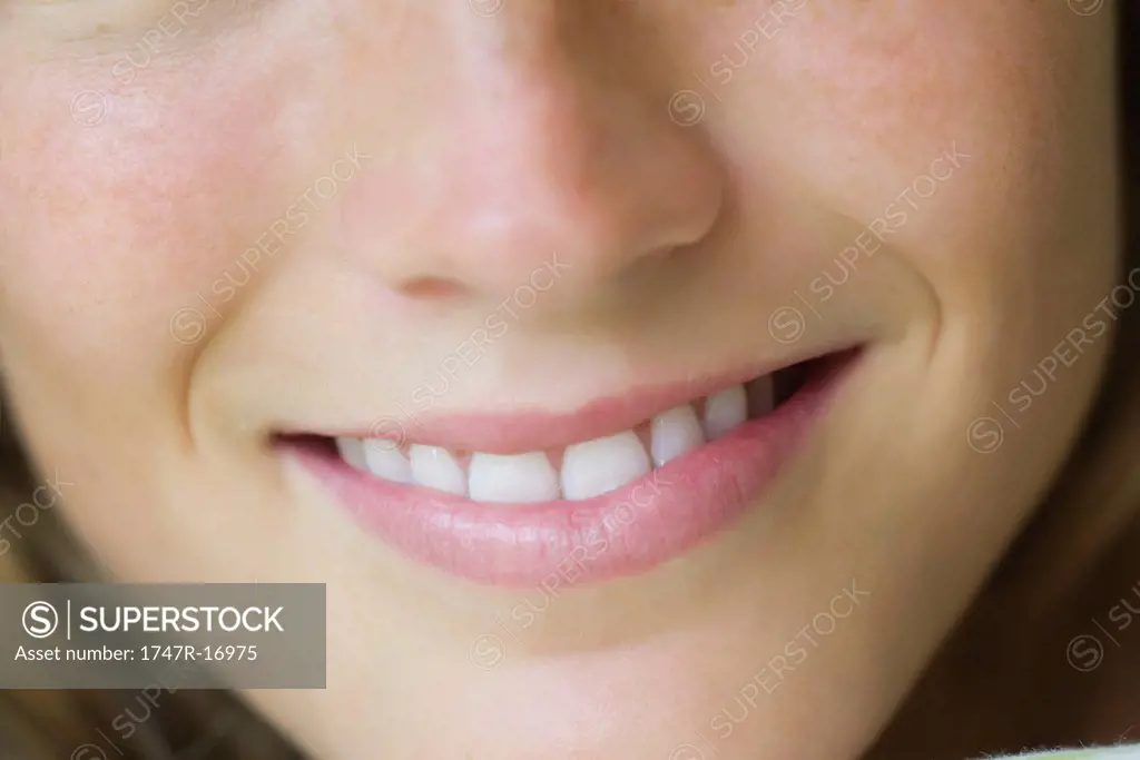 Close_up of young woman´s smile
