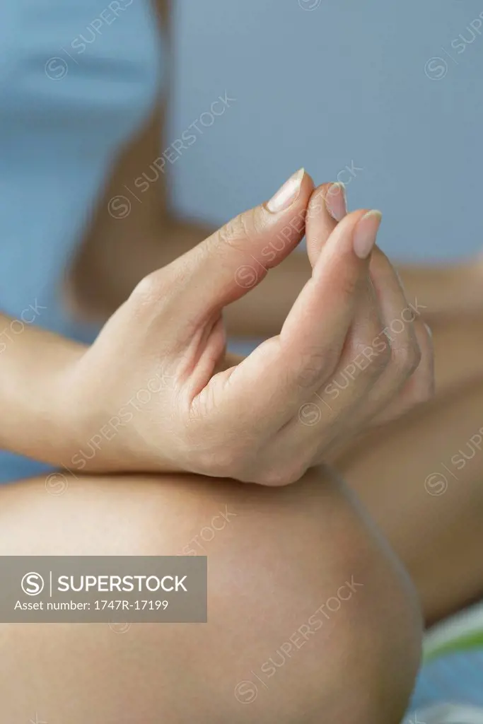 Woman´s hand in mudra position