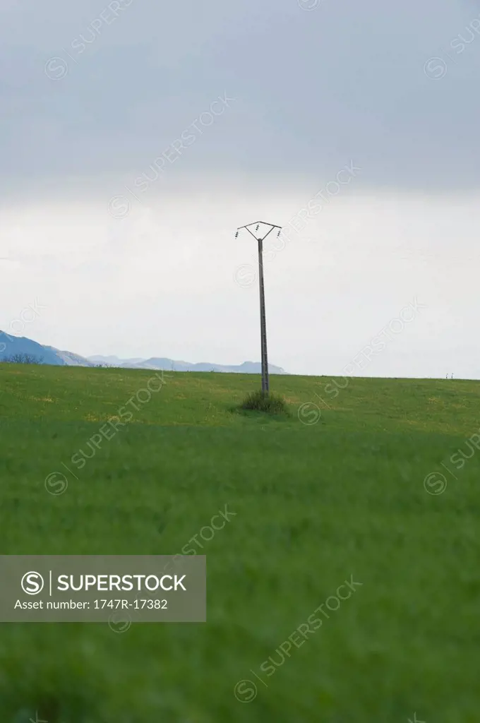Power lines in rural landscape