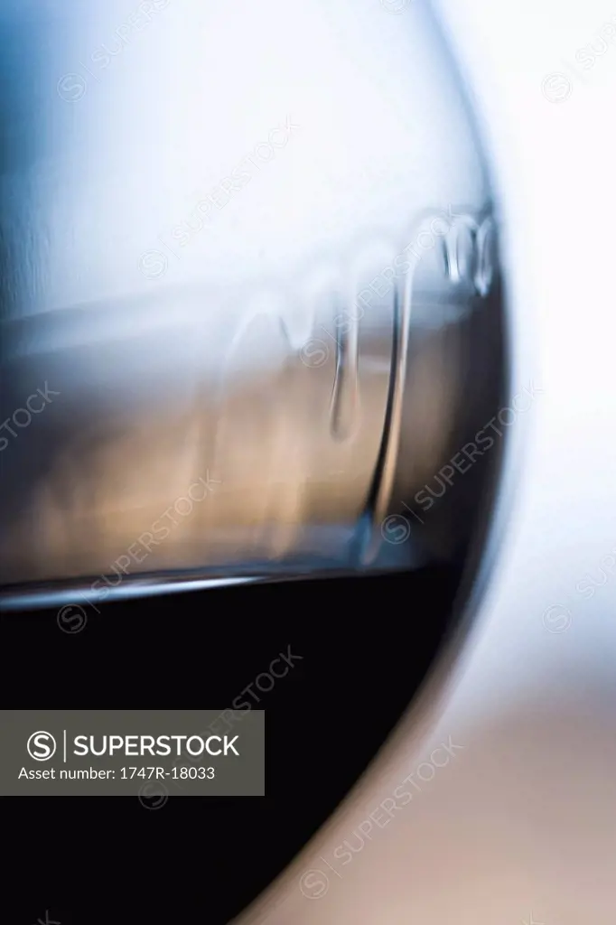 Wine tears on glass of red wine