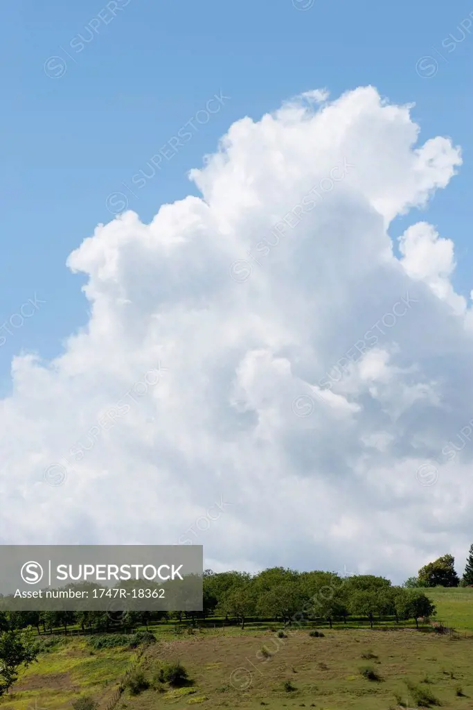 Cumulus clouds over countryside