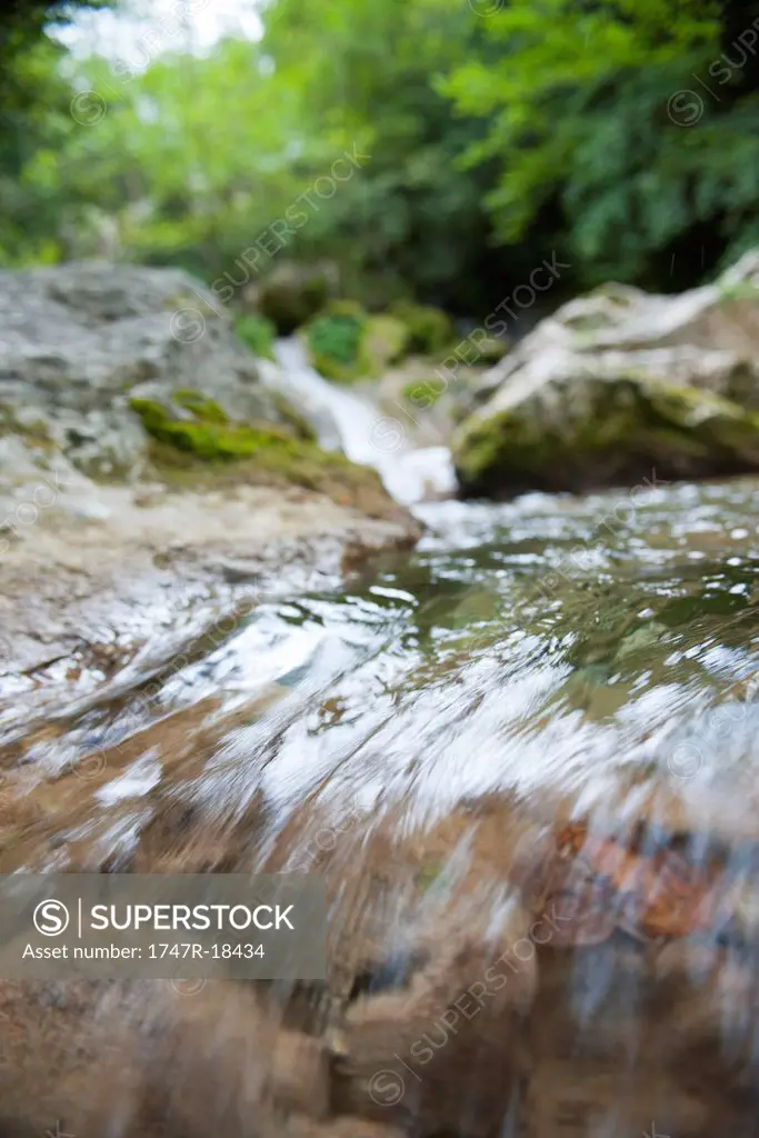Water flowing over rocks, close_up
