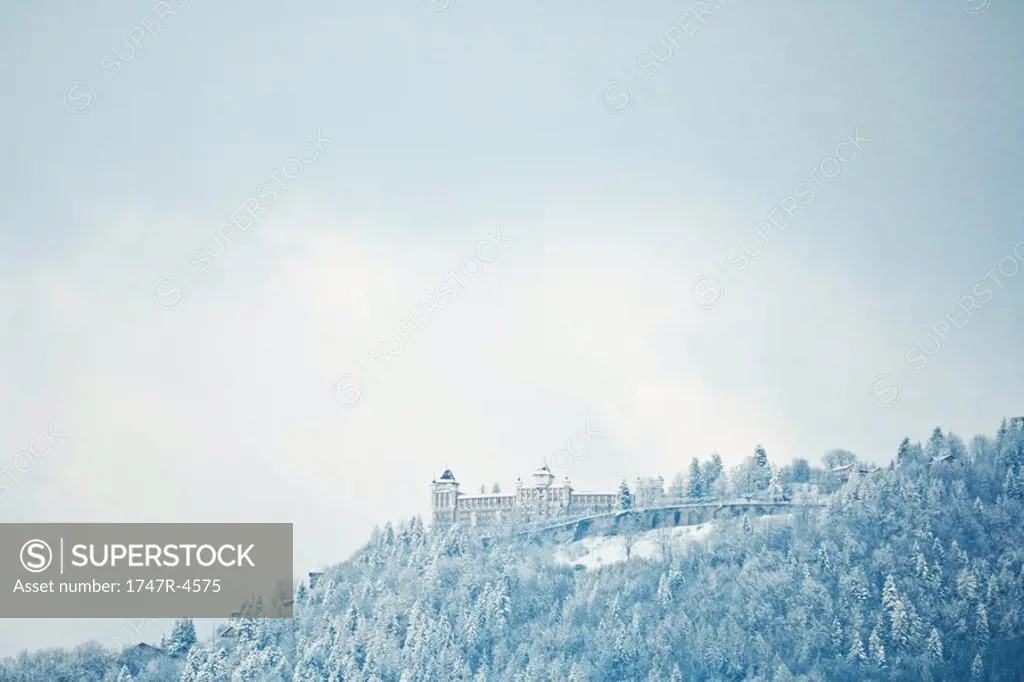 Switzerland, Vaud canton, Lavaux region, snowy mountain landscape with castle