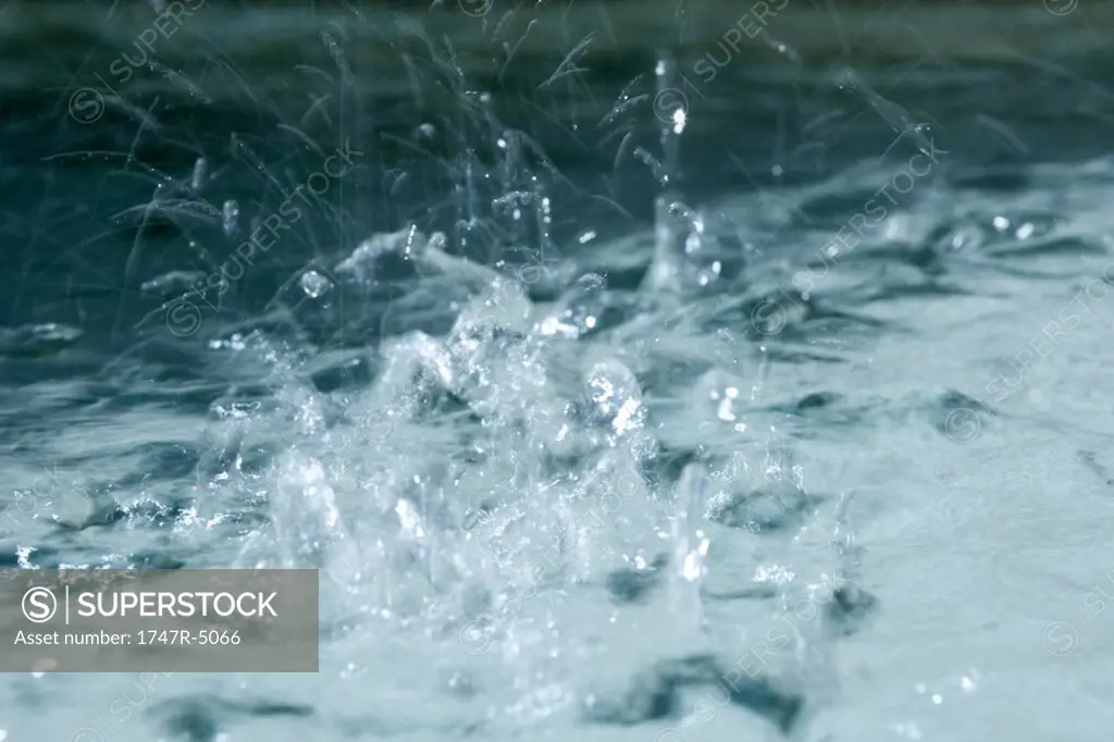 Water splashing, extreme close-up