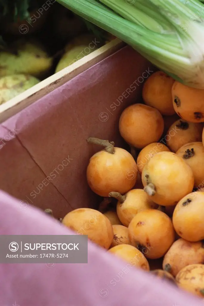 Medlar fruit in market stall