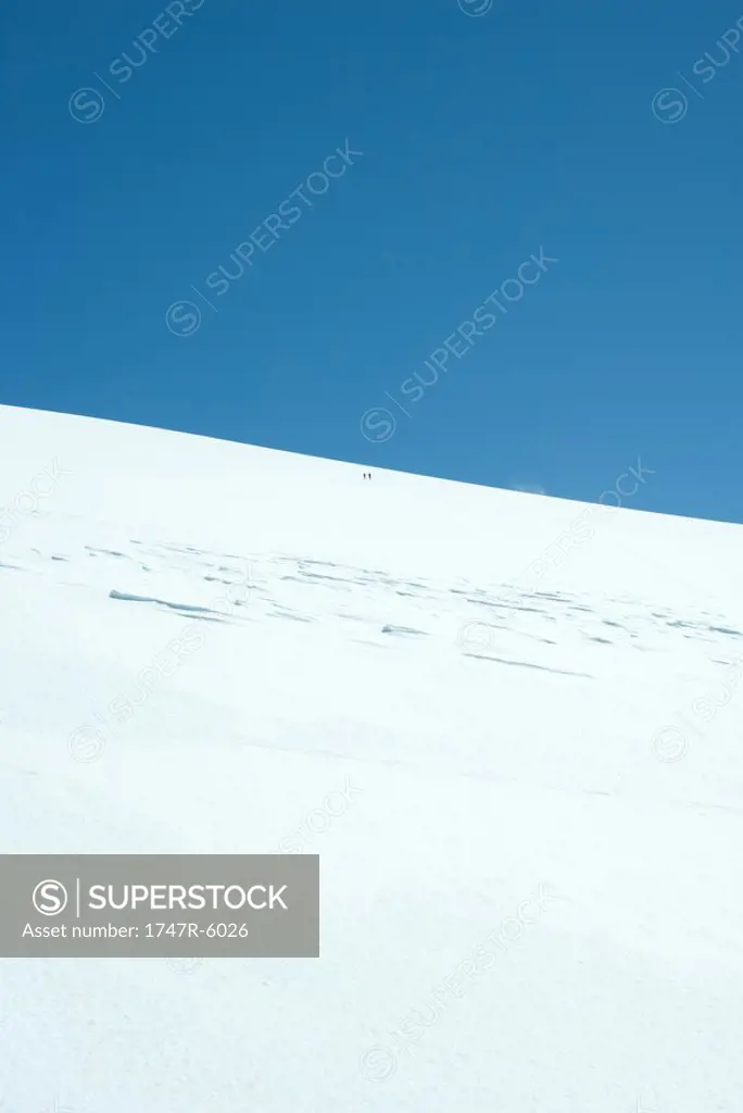 Skiers in far distance