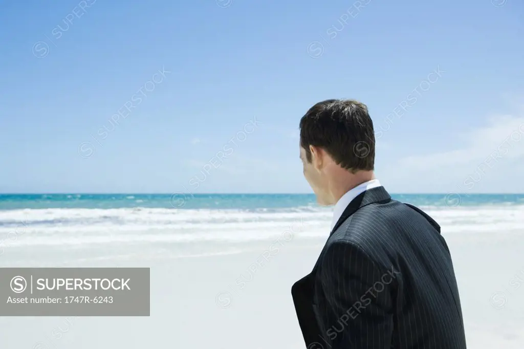 Businessman on beach