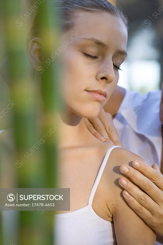 Woman having shoulder massage