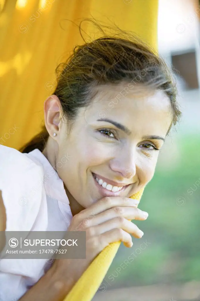 Woman resting in hammock, close-up