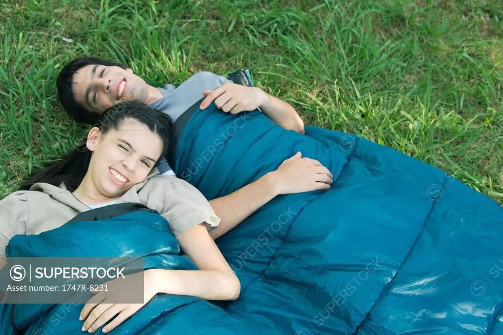 Young campers in sleeping bags