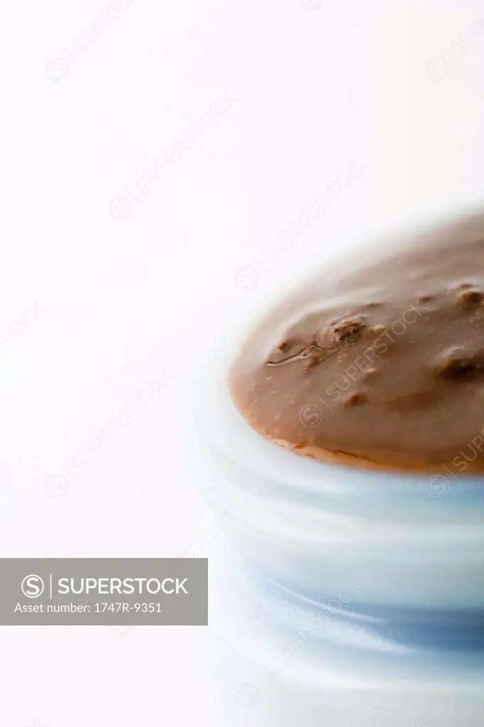 Chocolate in container, extreme close-up
