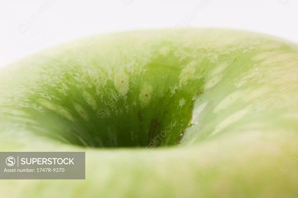 Granny Smith apple, extreme close-up, cropped view