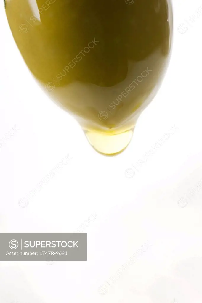 Olive dripping olive oil