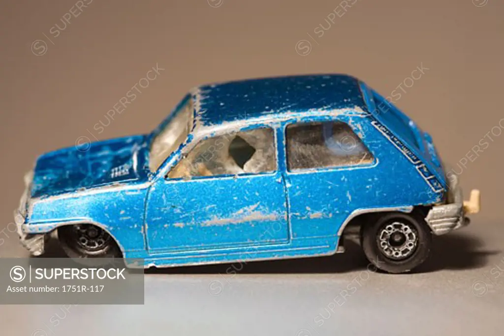 Close-up of a damaged toy car