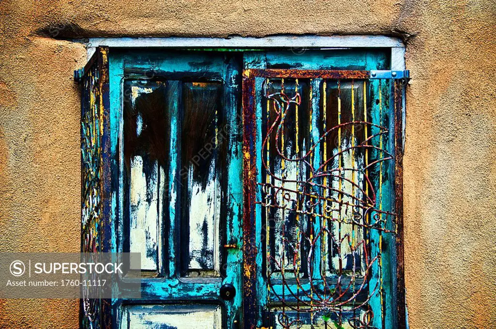 Santa Fe Doors, New Mexico, Details of colorful door and iron gate.