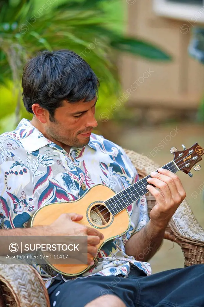 Hawaii, Maui, Local male playing an ukulele.