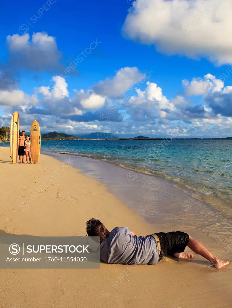 Hawaii, Oahu, Photographer Shooting A Portrait Session On The Beach