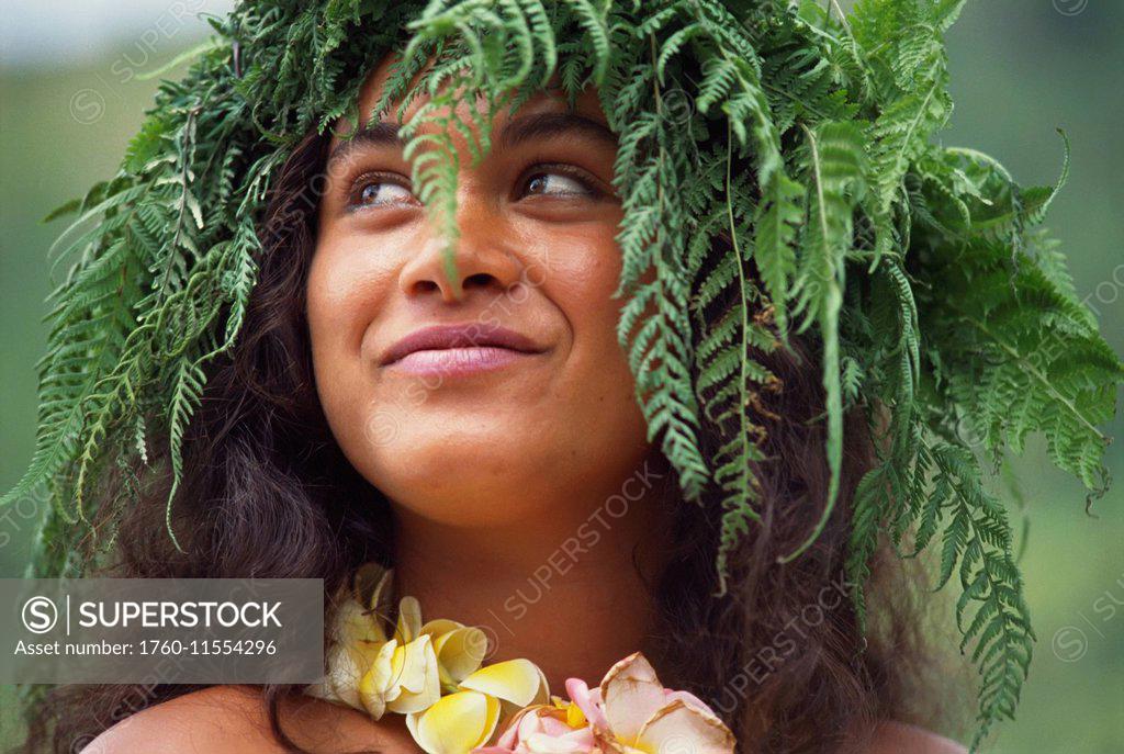 French Polynesia, Tahiti, Bora Bora, Portrait Of Local Woman With Fern Lei.  - SuperStock