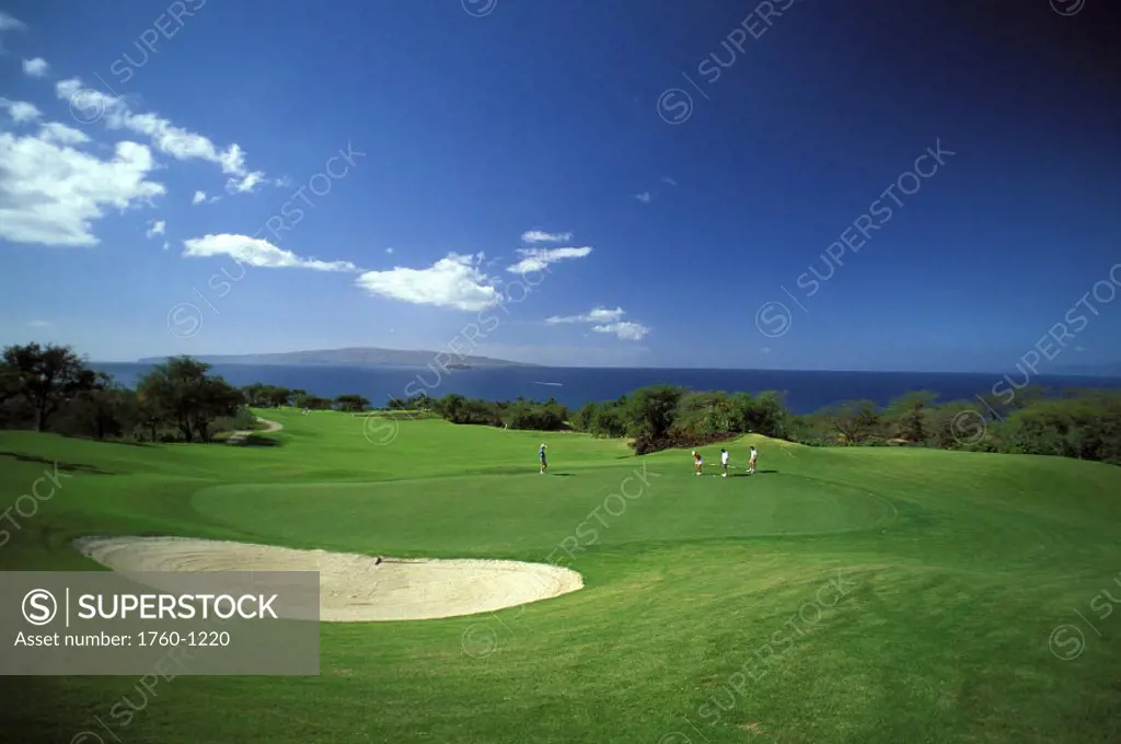 Hawaii, Maui, Wailea Golf Course, people playing on course